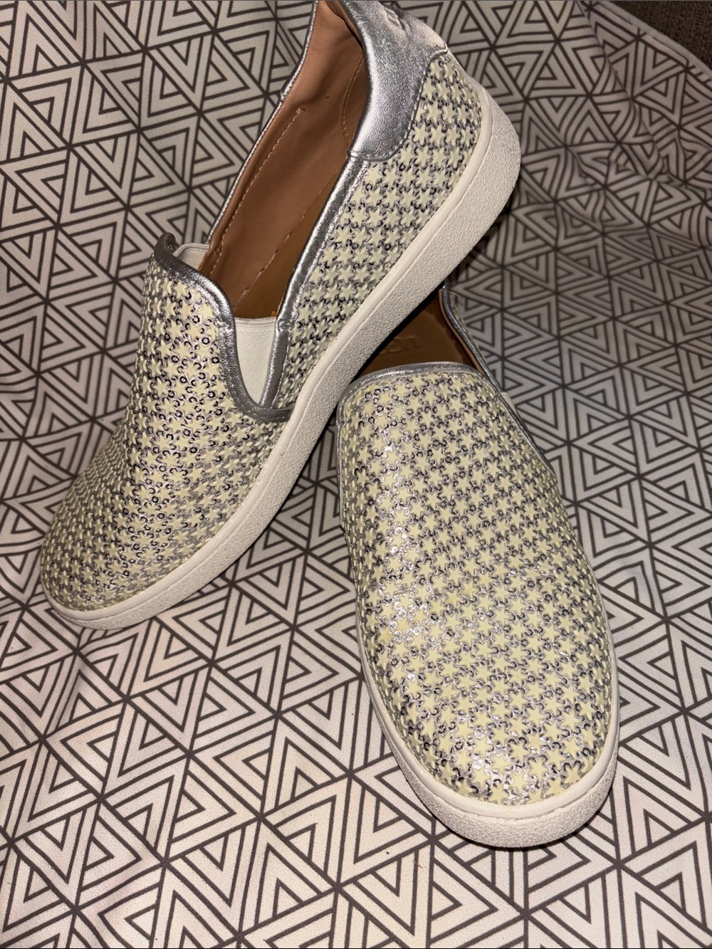 UGG Women’s Slip-On Woven Sneakers metallic silver with ivory stars